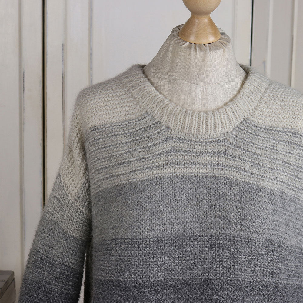 Close up of the garter stitch gradient in shades of grey