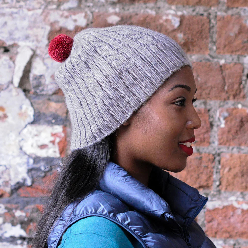 Cable and Rib hat kit by Sarah Hatton and featuring The Fibre Co. yarn, Road to China Light.