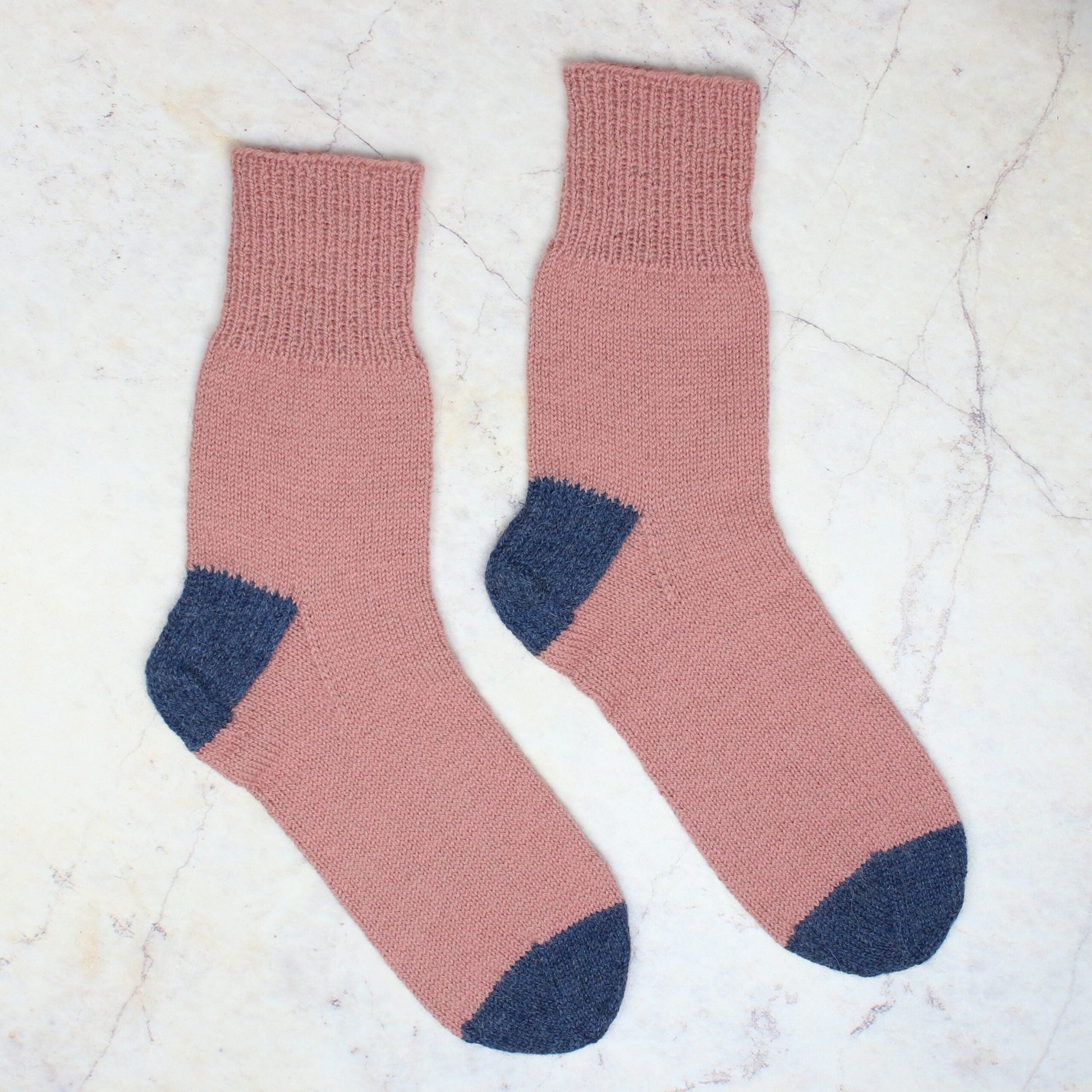 One Sock Essential from The Fibre Co. - Featuring the sock pattern from Kate Atherley in our eco-friendly fingering weight sock yarn Amble.