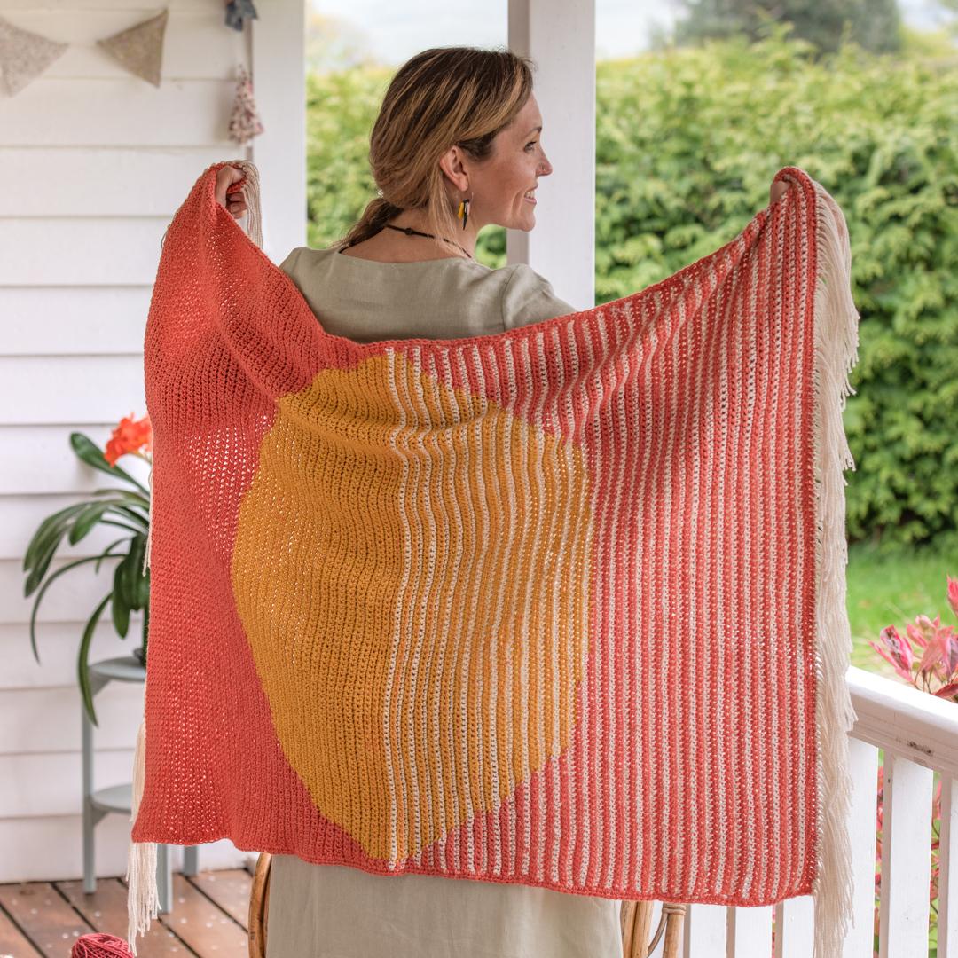 April Gopwani’s Rise and Set Blanket is inspired by the warm tones of the rising and setting sun, and features in our By Hook Collection.