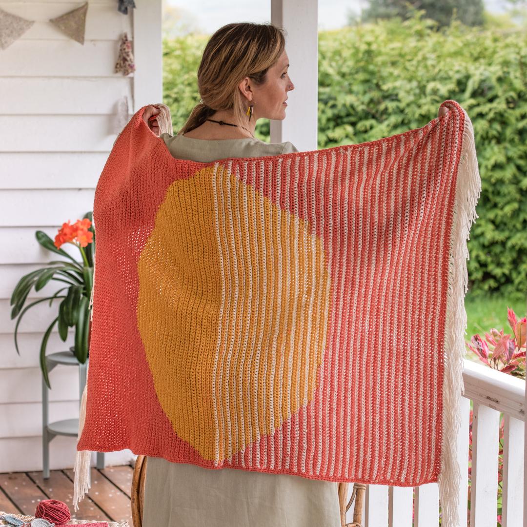 April Gopwani’s Rise and Set Blanket is inspired by the warm tones of the rising and setting sun, and features in our By Hook Collection.