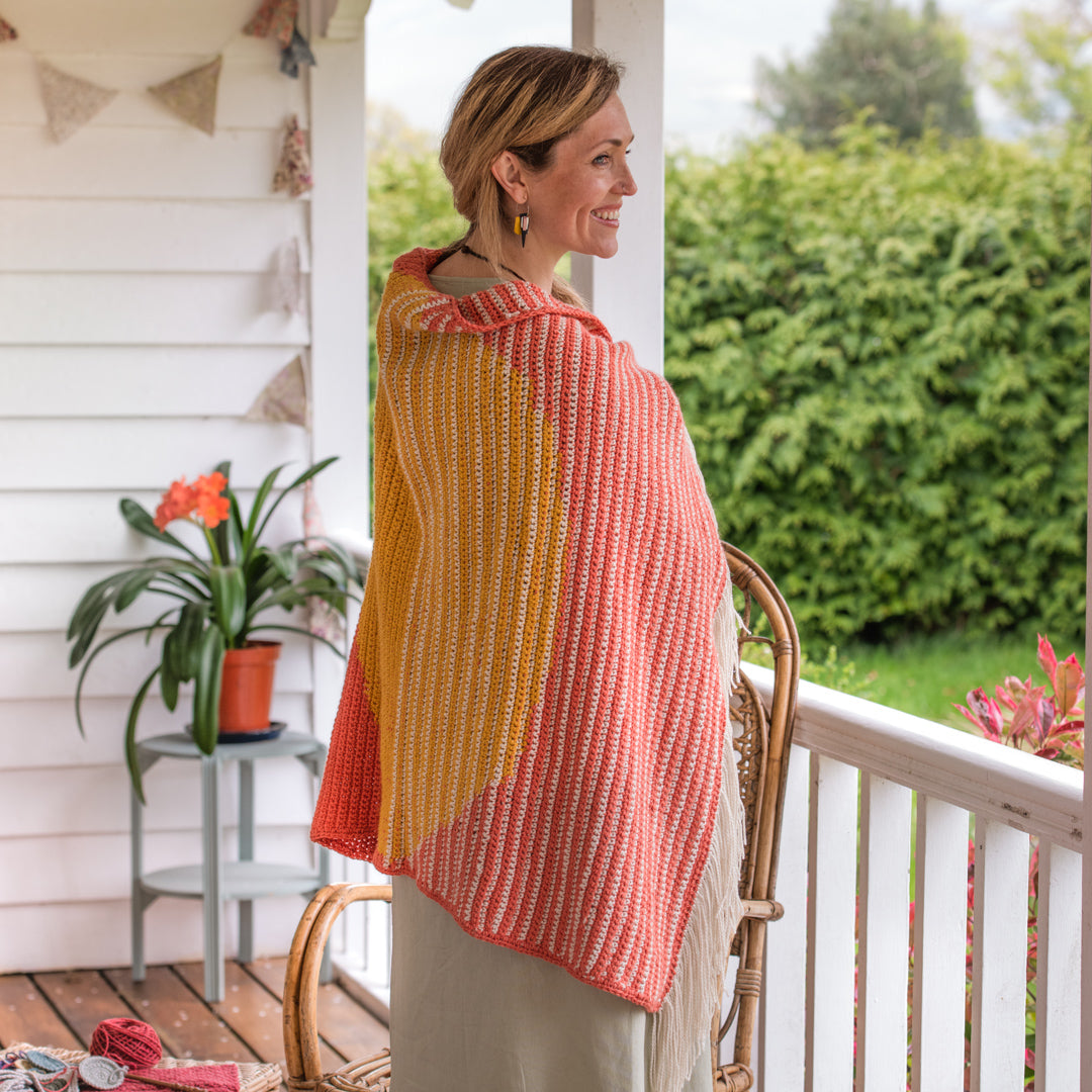 April Gopwani’s Rise and Set Blanket is inspired by the warm tones of the rising and setting sun, and features in our By Hook Collection.