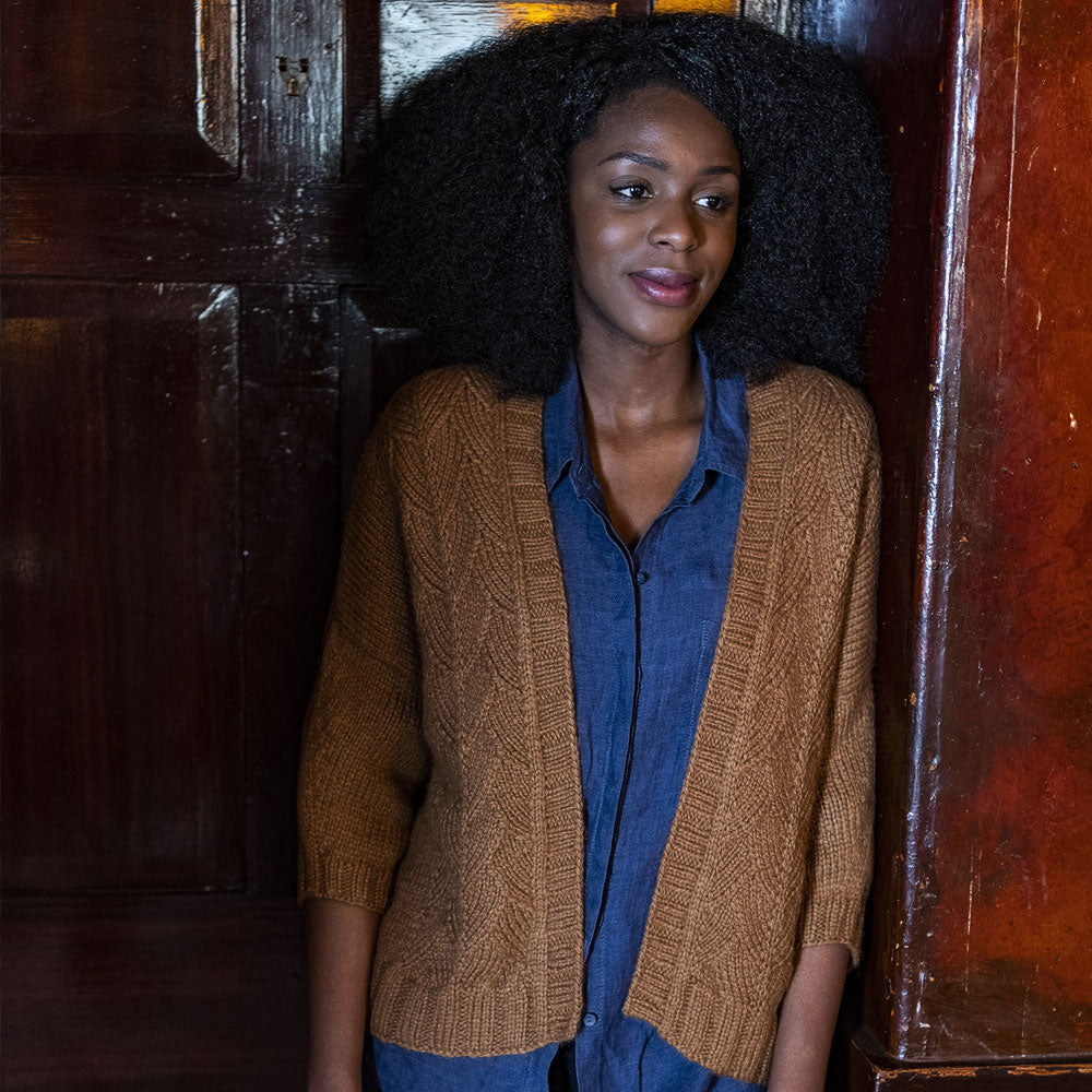 Ullock by Marie Greene in The Fibre Co. Tundra as part of Foundations AW19/20 | A bulky-knit oversized cardigan with three-quarter sleeves and an open-front. It has a vine stitch going up the front panels.